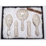 Contemporary silver mounted ladies' six piece dressing table set - comprising two pairs brushes and