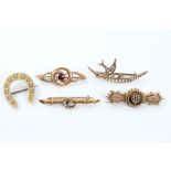 Group of five Victorian brooches - to include seed pearl crescent brooch with flying bird,