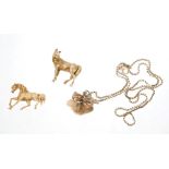 Gold (9ct) 'horse jumping' pendant on a chain, Italian yellow metal 'horse' brooch,