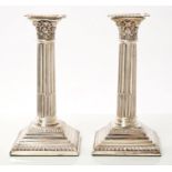 Pair Edwardian silver Corinthian column candlesticks with separate sconces,