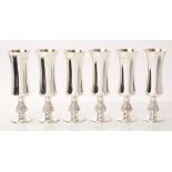 Set of six contemporary silver goblets of waisted form, with ornate stems,