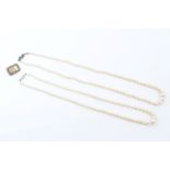 Two cultured pearl necklaces, each with a string of graduated cultured pearls,