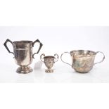 Collection of three early 20th century silver trophy cups including one in the form of a porringer,