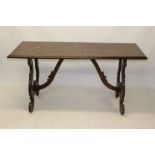 Antique Spanish walnut dining table with moulded rectangular top,