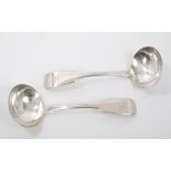 Pair early Victorian provincial silver fiddle pattern sauce ladles with engraved armorial crests