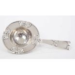 Early 20th century Danish silver tea strainer of circular form,