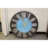 Large wooden tower clock dial of circular form,