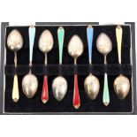 Set of eight silver gilt and guilloche enamel coffee spoons in a fitted case (Birmingham 1958),