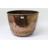 Large copper vessel of hemispherical form, of riveted construction,