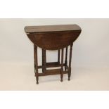 17th century-style oak spider gateleg table with elliptical drop-leaf top,