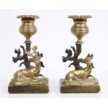 Pair of 19th century bronze and ormolu candlesticks with stag and doe figure and single sconce,