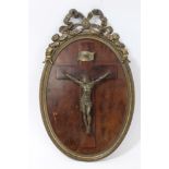 19th century ormolu figure of Christ on the cross, in oval ormolu frame with ribbon mount,