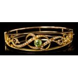 Edwardian peridot and seed pearl hinged bangle,