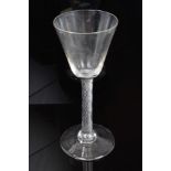 Mid-18th century wine glass with bucket bowl, double air-twist stem on splayed foot,