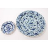 18th century Delft blue and white charger painted with birds, fruit and flora,