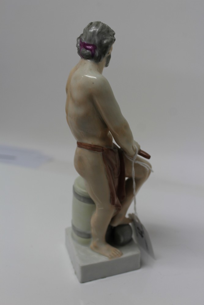 Early 19th century Continental porcelain figure of a semi-clad blacksmith with hammer and anvil, - Image 9 of 17