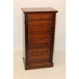 Victorian mahogany Wellington chest with seven graduated drawers between flanking locking stiles,