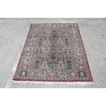 Eastern rug with five rows of ornamental mihrab windows within conforming border,