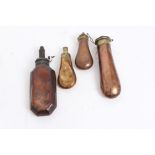 Group of five 19th century brass and copper powder flasks