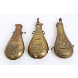 Group of three 19th century brass powder flasks with embossed American Military insignia