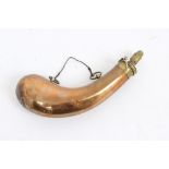 Unusual 19th century copper and brass powder flask of curved form,