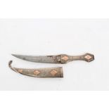 Arab Jambia dagger with engraved white metal hilt and scabbard,