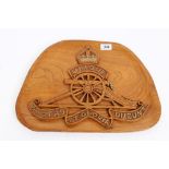 Good quality relief carved chestnut plaque of the Royal Regiment of Artillery badge - with