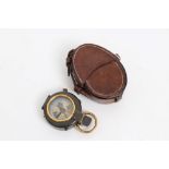 First World War Officers' prismatic compass in brown leather pouch,