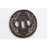 19th century Japanese bronze and silver tsuba with hoho bird and cloud decoration, signed, 8cm x 7.