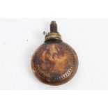 19th century copper and brass powder flask of circular form