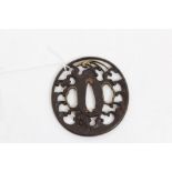 Fine 18th century Japanese iron tsuba with gold bird with pierced waves,