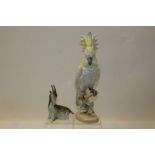 Royal Dux porcelain figure of a cockatoo, together with another of a goat.