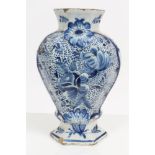18th century Dutch Delft blue and white vase with moulded and painted floral decoration,