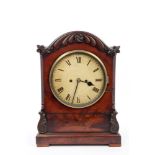 Regency bracket clock with white painted dial with Roman numerals,