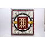 Of Local Interest: Late 19th / early 20th century stained glass window centred by portcullis in