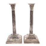 Pair tall George III silver Corinthian Column candlesticks with fluted columns and pierced capitals,