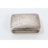 George IV silver vinaigrette of rectangular cushion form, with engraved floral decoration,