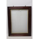 A Victorian mahogany frame with hinged glass door - internal size 115cm x 80cm