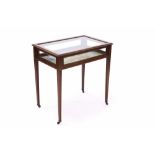 Edwardian mahogany and satinwood bijouterie table with hinged glazed top and glazed sides,