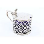 Victorian silver mustard of drum form, with pierced star and flower-head decoration,