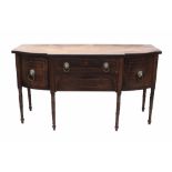 George III mahogany and boxwood line-inlaid bow front sideboard with central frieze drawer and