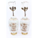 Pair of Continental porcelain ovoid vases with cover, mounted as table lamps,