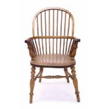 19th century ash and elm stick back chair with arched back and saddle seat on turned legs,