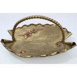 Antique brass and copper mounted tray with surmounting barley-twist handle,