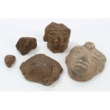 Five pre-Columbian pottery mask fragments - the largest 9cm high