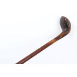 Late 19th century novelty carved wooden walking stick in the form of a golf club,