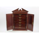 Late Victorian mahogany collectors' cabinet with broken arch pediment and pair of fielded panel