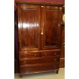 William IV mahogany linen press with gadrooned cornice,