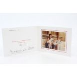 TRH The Prince and Princess of Wales - signed Christmas card with twin gilt embossed Royal ciphers