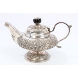 Early 20th century Eastern silver teapot of compressed baluster form,